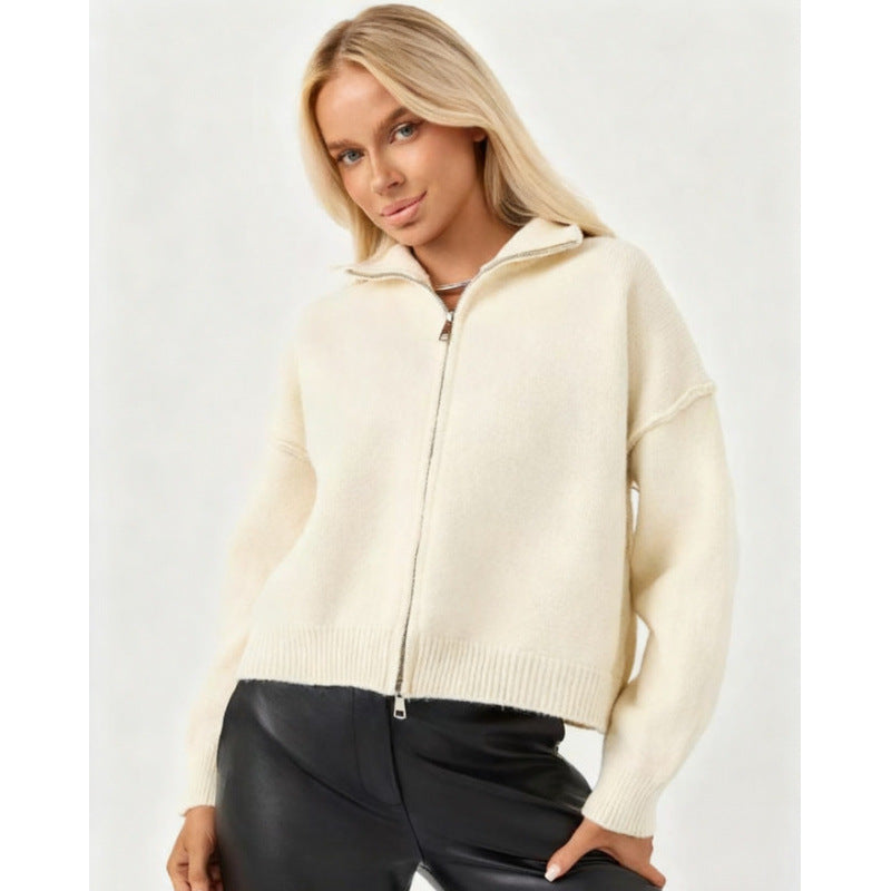Women’s oversized zip-up cardigan sweater, off-white funnel neck, full-zip front.