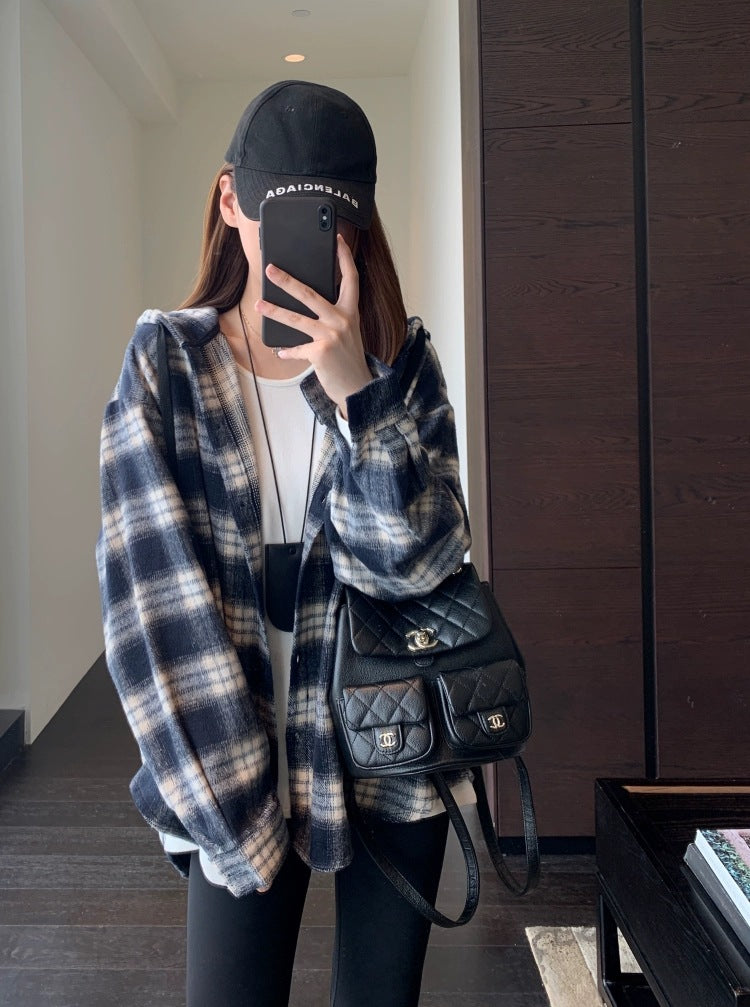 Women's blue plaid hooded shirt-jacket with button front and relaxed fit