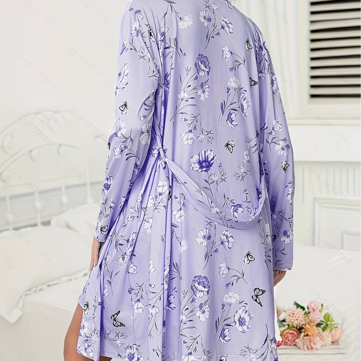 Lavender floral robe with gathered waist detail, flowing sleeves, and side slit
