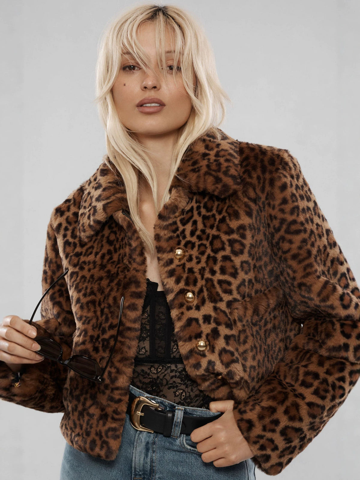 Leopard print faux fur short coat with lapel and gold buttons, front view