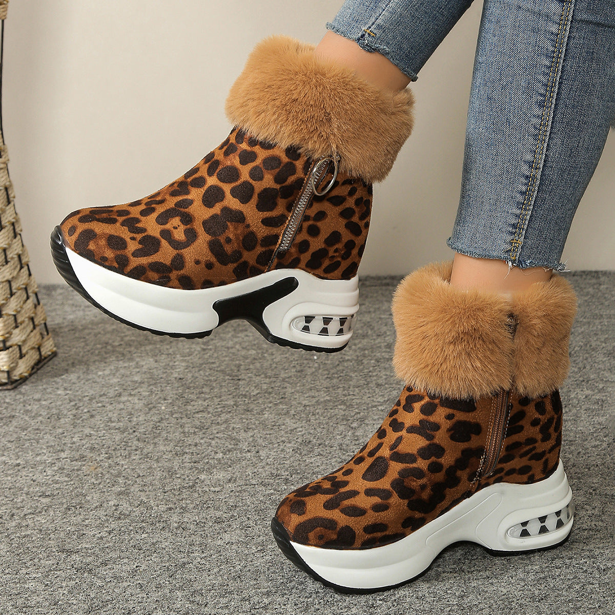 Brown leopard print fleece-lined snow boots with side zipper, faux-fur cuffs, chunky platform sole