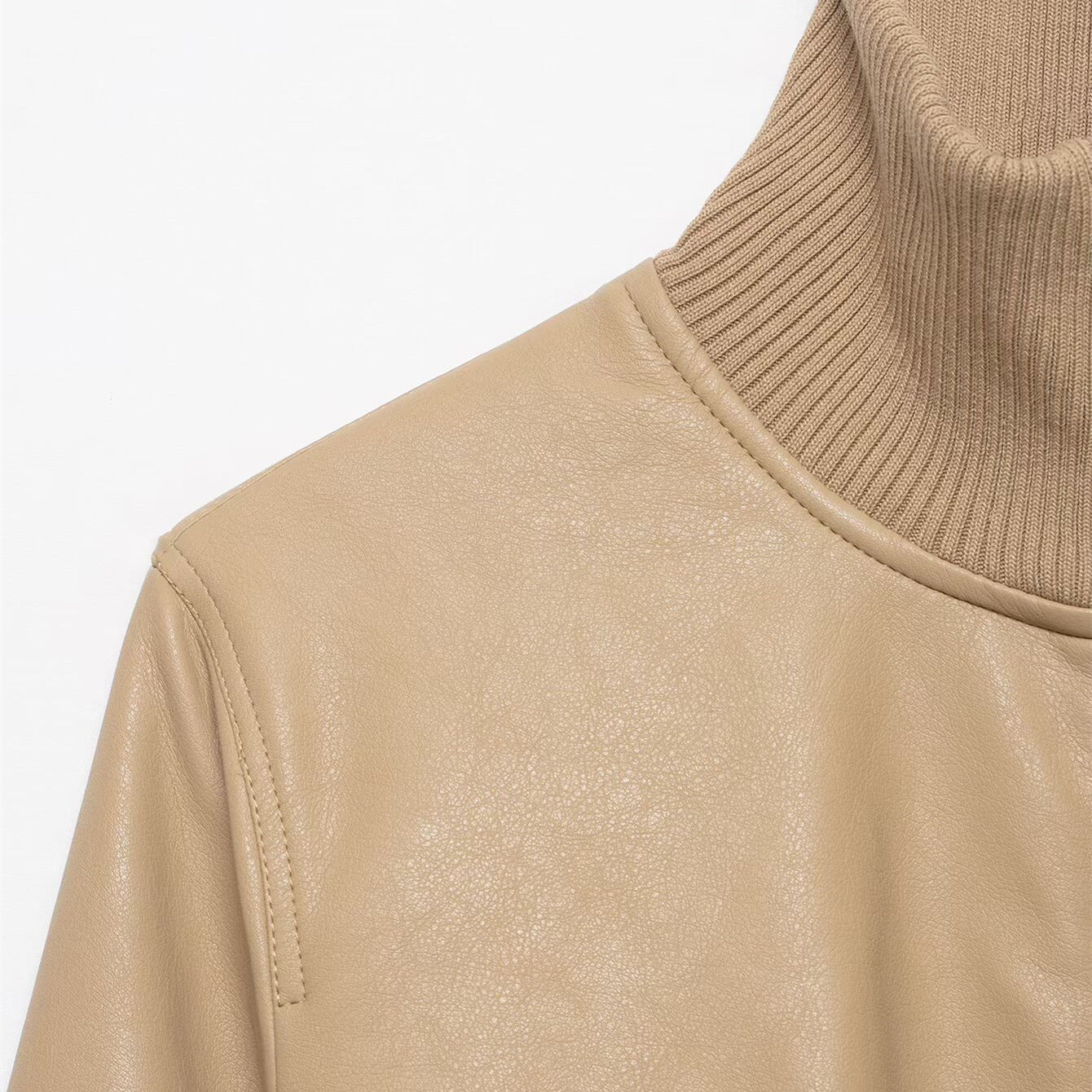 Khaki faux leather jacket shoulder seam detail with ribbed knit collar edge