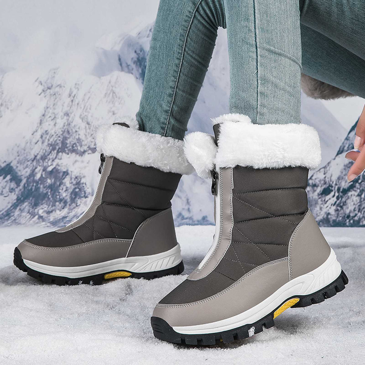 Women's dark gray mid-calf snow boots, faux-fur cuffs, side zip, rugged outsole.