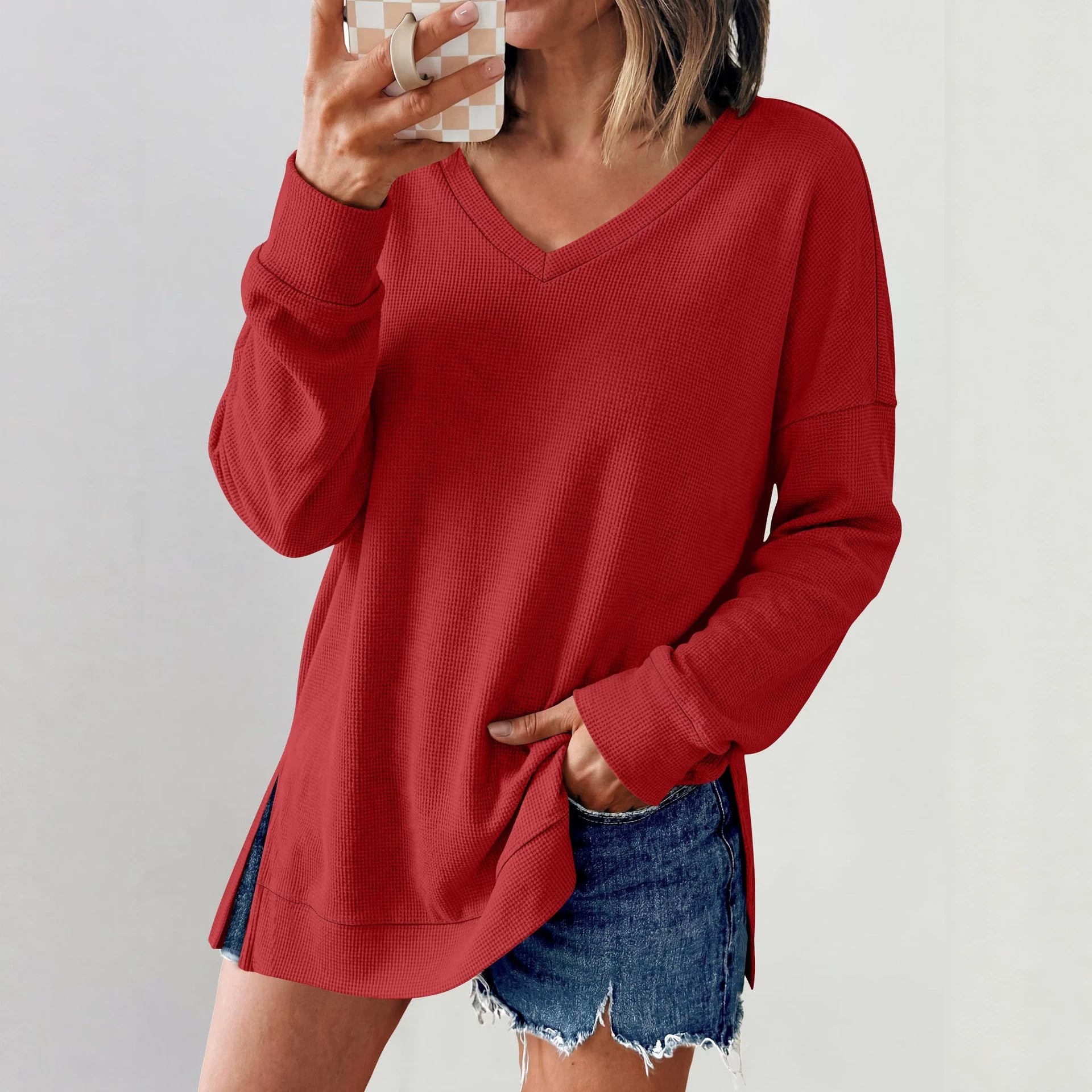Women’s red V-neck long-sleeve waffle knit loose T-shirt top, relaxed fit.