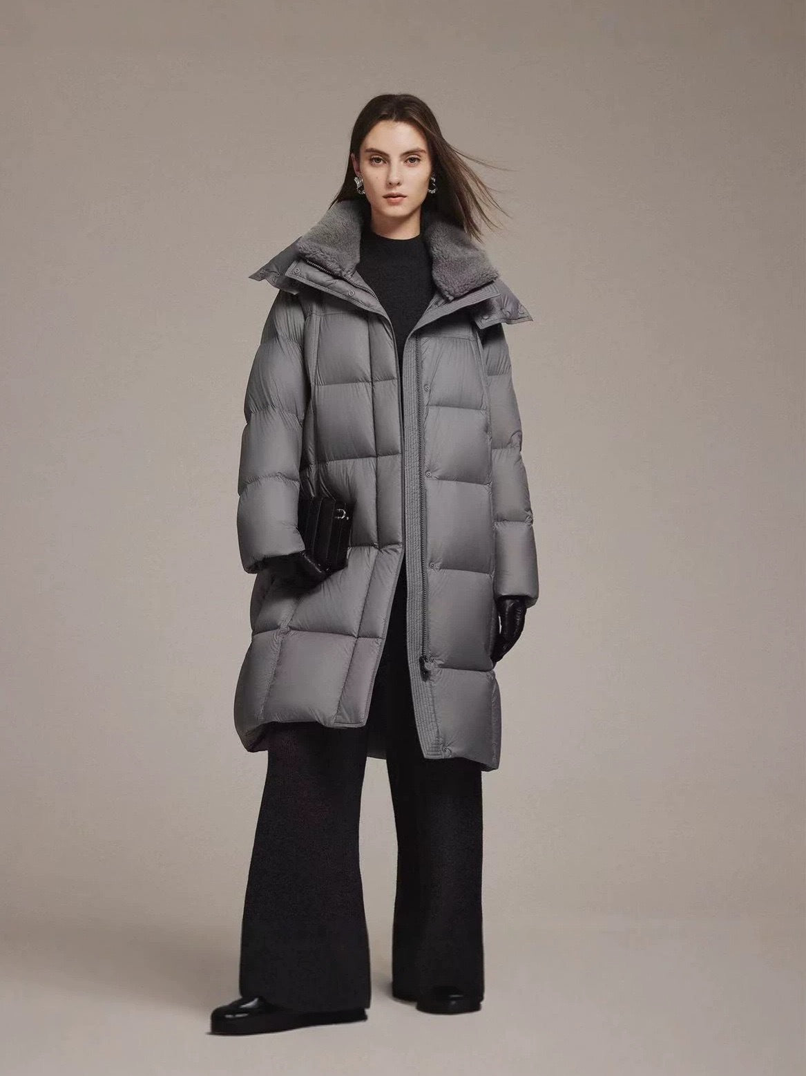 Women's light gray long down jacket with fur-trimmed collar and front zip