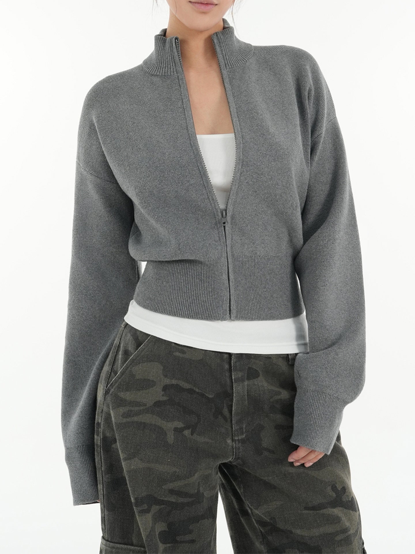 Gray cropped zip-up mock neck knit cardigan with ribbed waist hem