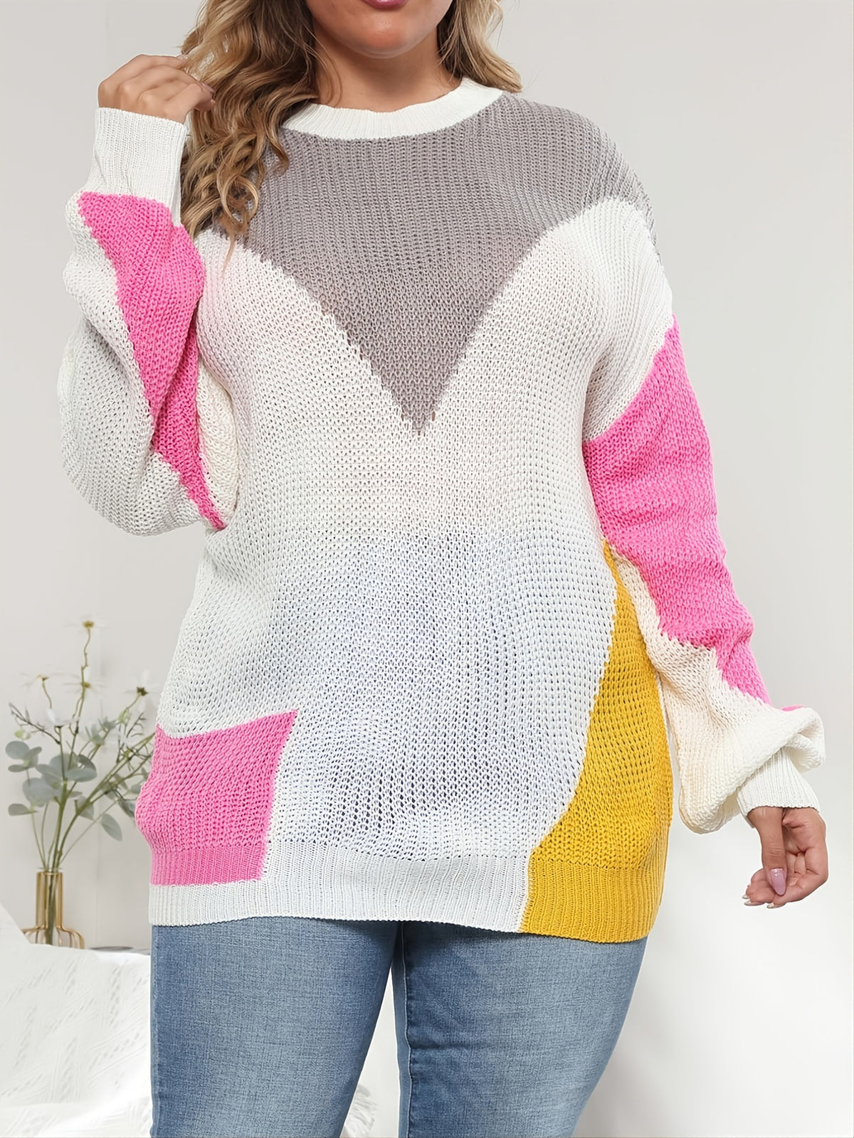Contrast stitch plus size knit sweater with white front and pink sleeves plus yellow accent