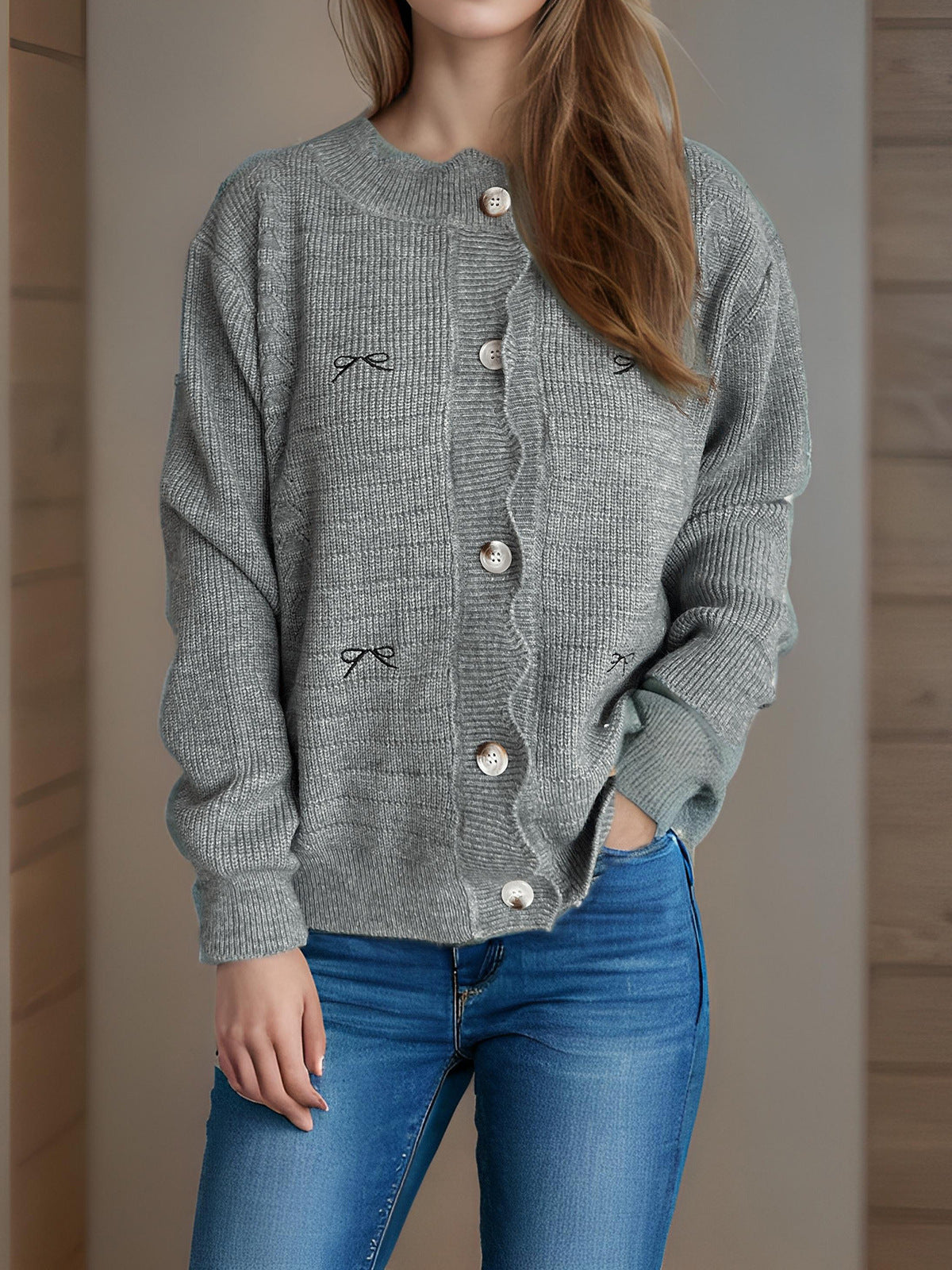 Gray knit cardigan sweater with bow embroidery, button front, dropped shoulders