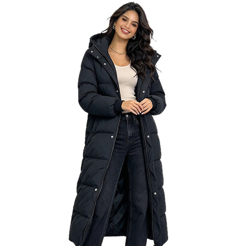 Women’s long black hooded puffer coat with a standing collar and quilted design.