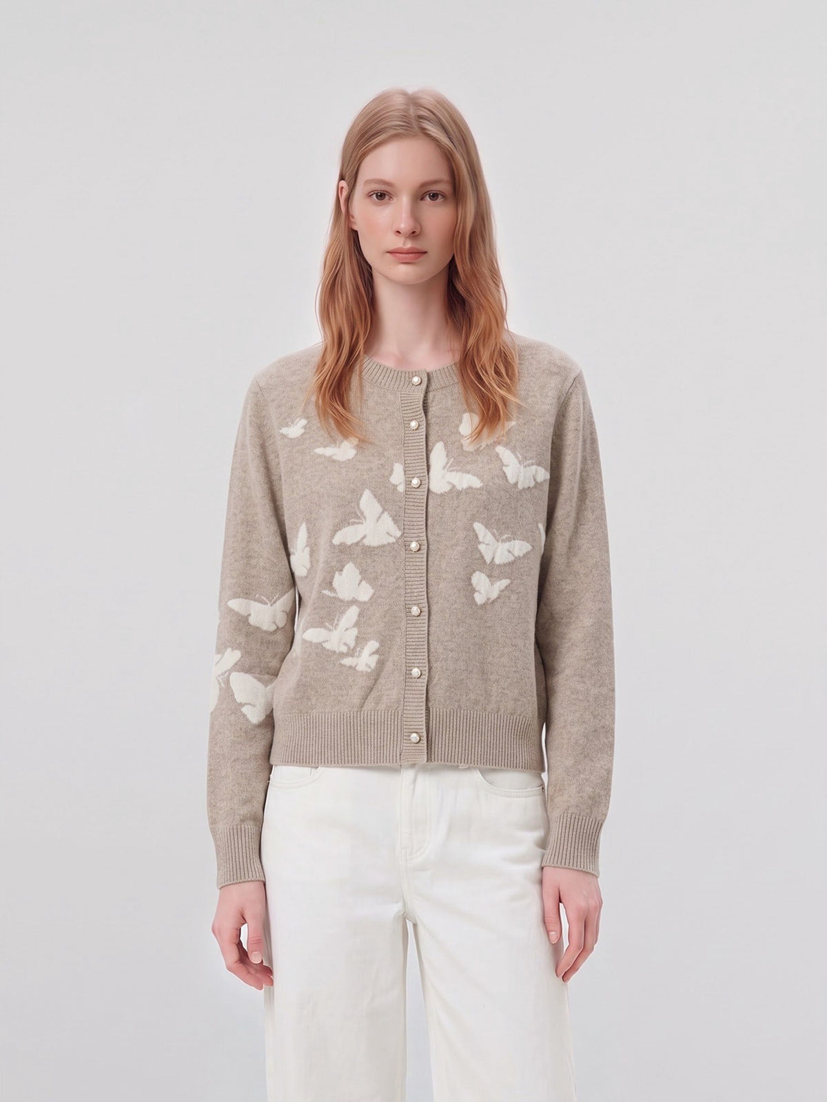 Women’s sand knit cardigan sweater with butterfly applique and button front