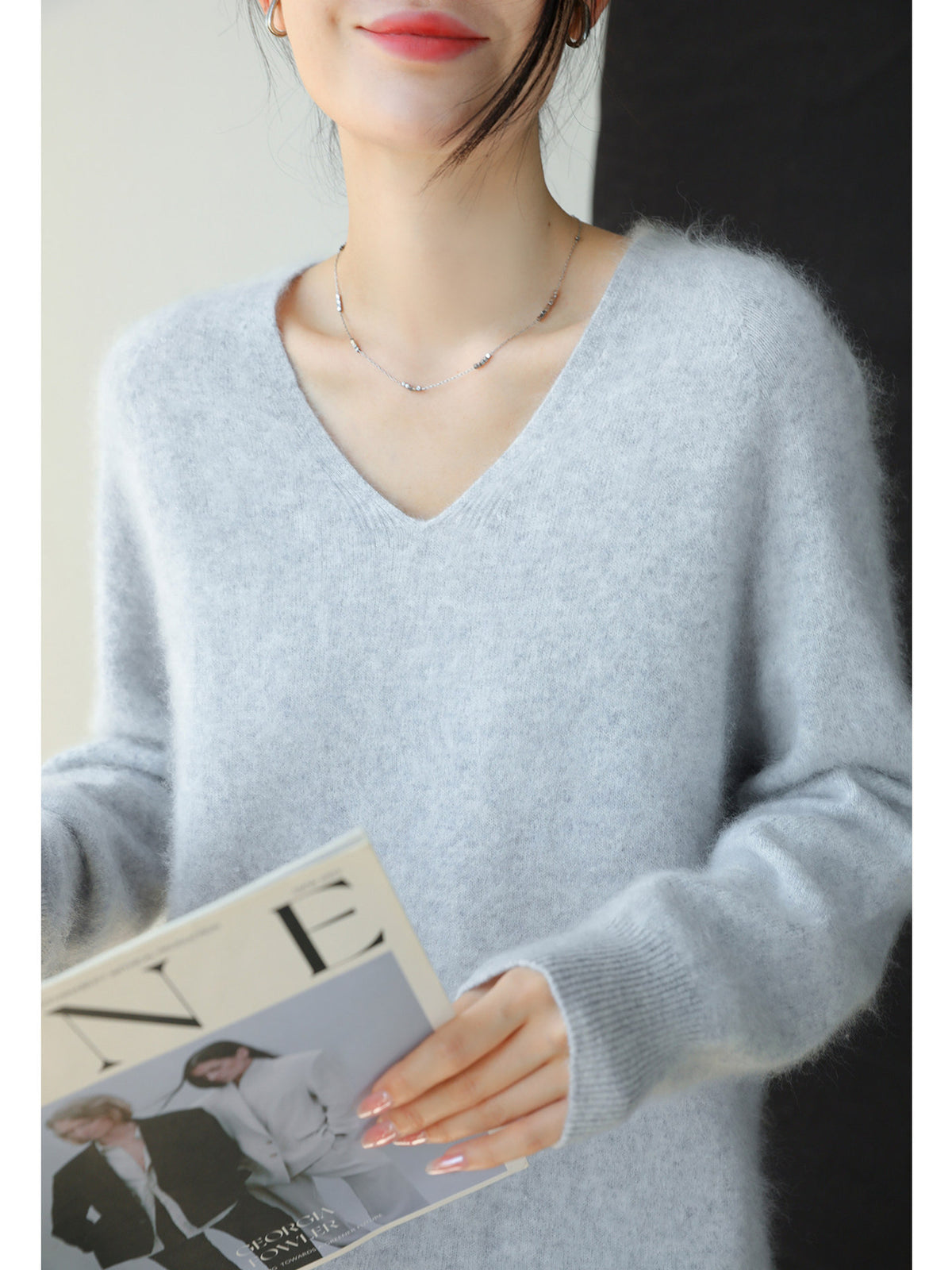 Light blue women's V-neck brushed knit sweater, long sleeves