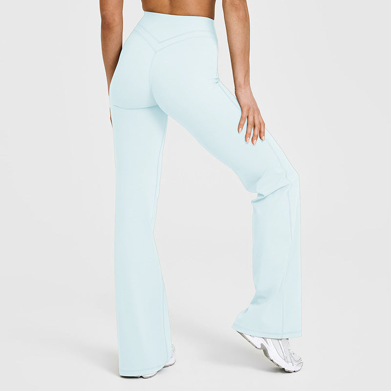 Women’s flared yoga pants in light blue with smooth finish and flared bell hems
