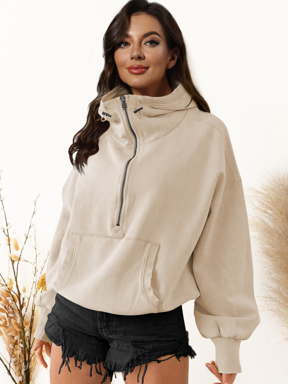 Cream hooded zip sweatshirt with drawstring and front kangaroo pocket