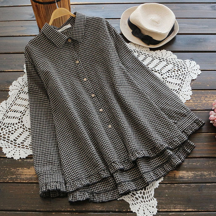 Black check oversized button-front shirt with ruffle peplum hem, chest buttons