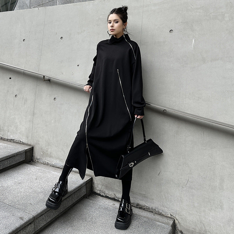Black knit midi dress with funnel neck, asymmetrical zip, side slit, long sleeves