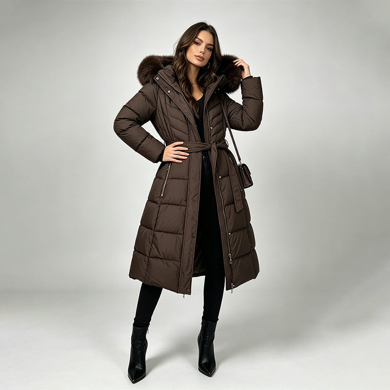 Women's long belted puffer coat with fur-trimmed hood, dark brown
