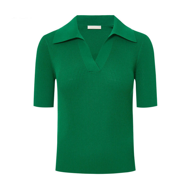 Green ribbed knit polo top, short sleeves, open collar, flat lay