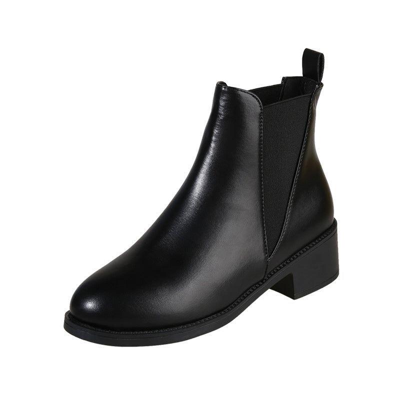 Black leather-look chelsea boot with round toe, elastic gore, block heel.