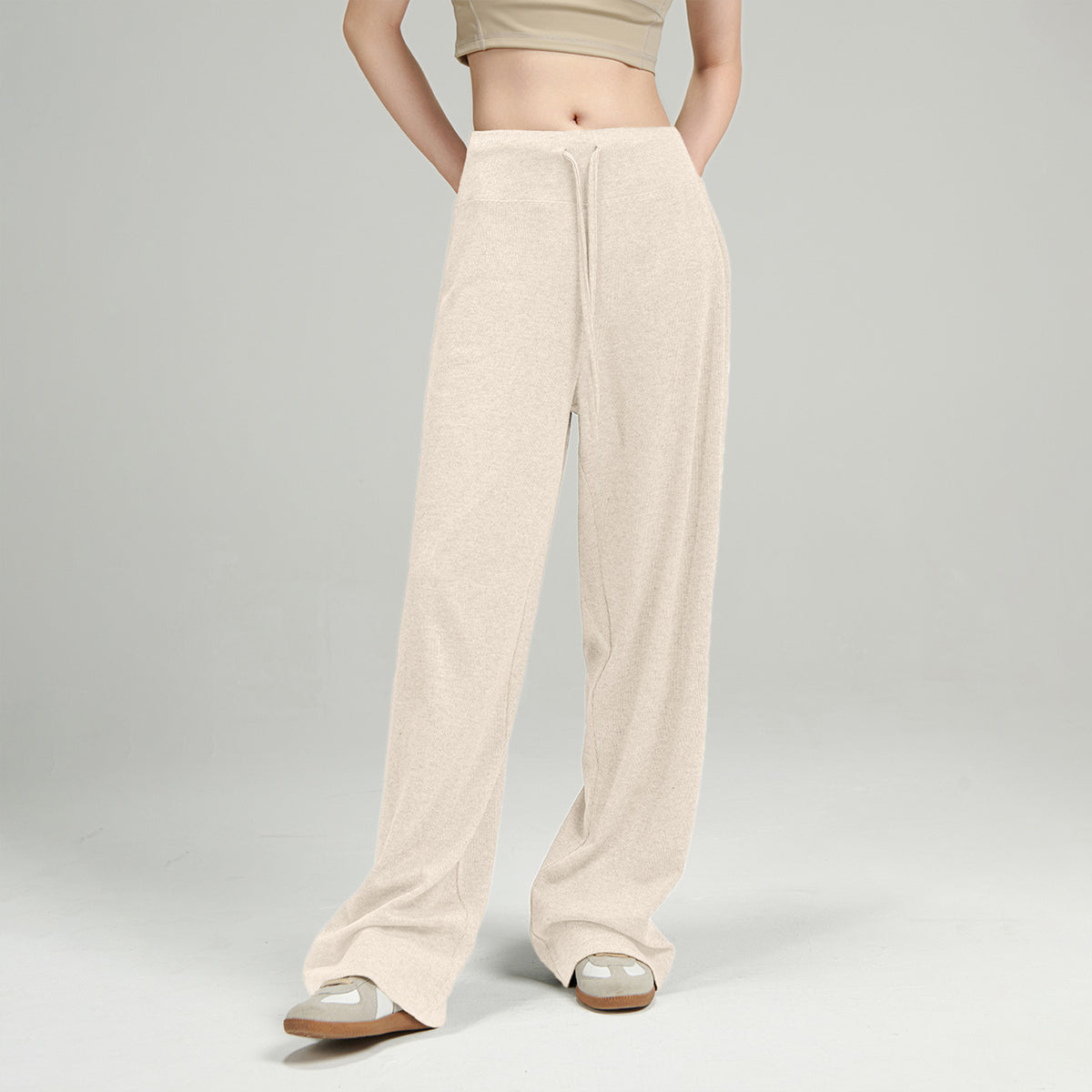 Apricot knit lounge pants with drawstring waistband and wide straight legs