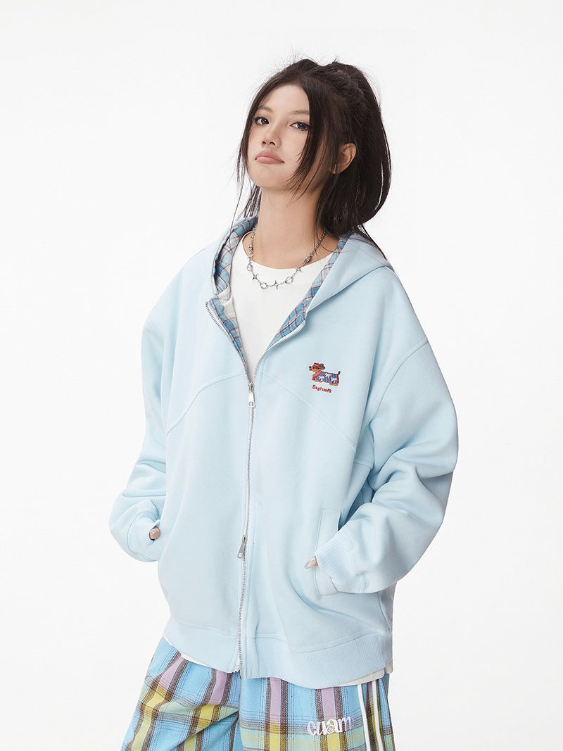 Light blue zip-up hooded jacket with dachshund chest embroidery, long sleeves