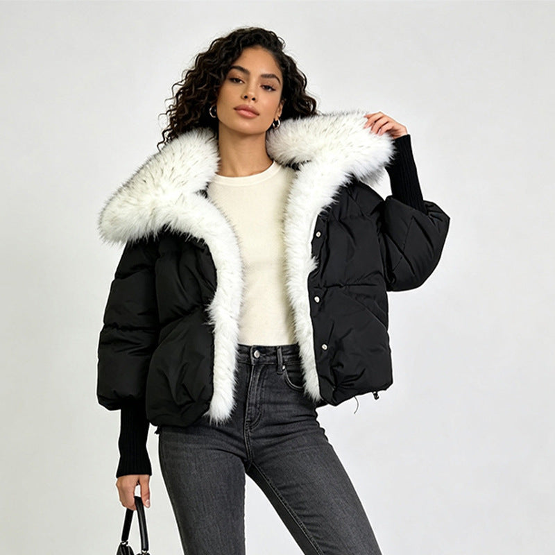Women’s black puffer jacket with white faux fur trim, button front, long sleeves