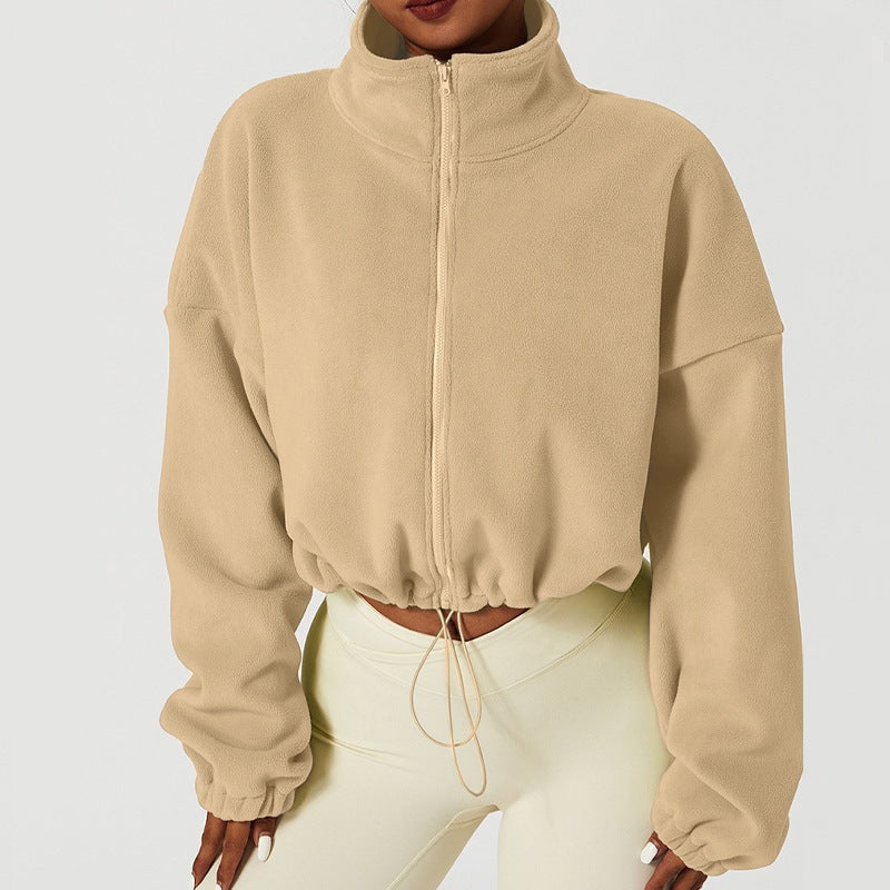 Women’s fleece-lined jacket in tan, full-zip stand collar, gathered cuffs and drawstring hem