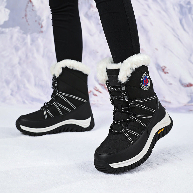 Women’s snow boots, black high-top with faux-fur cuffs, lace-up front and thick sole