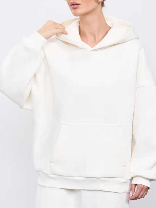 White women’s hooded sweatshirt with front kangaroo pocket and adjustable hood