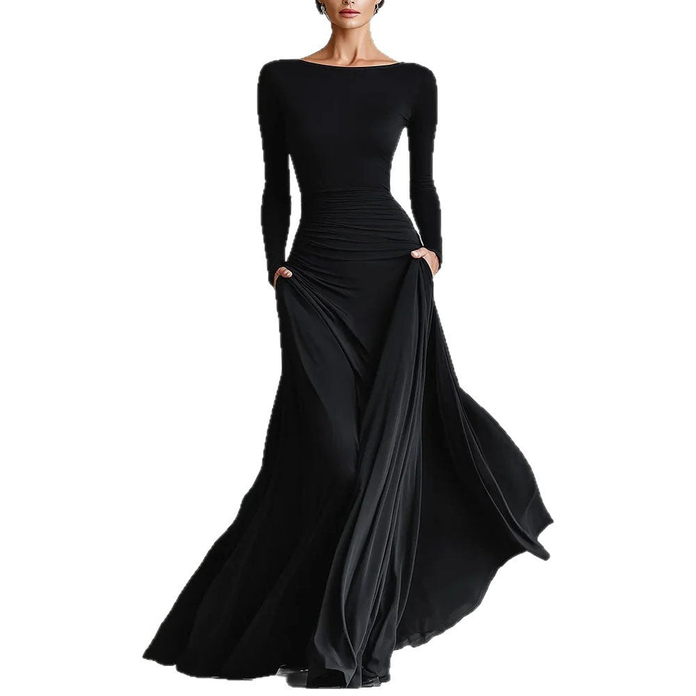 Black long-sleeve mermaid maxi dress with ruched waist and flowing draped skirt, front view