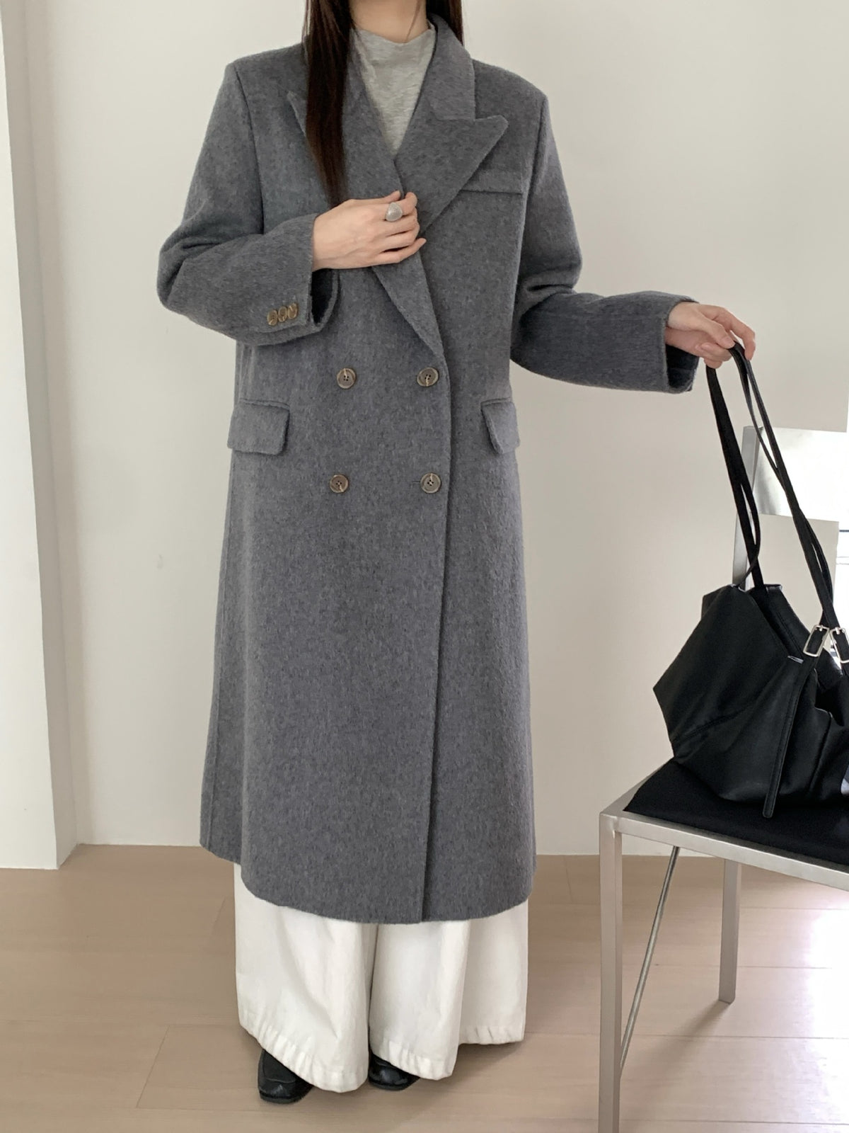 Medium-gray long double-breasted cashmere coat with high collar and metal-look buttons