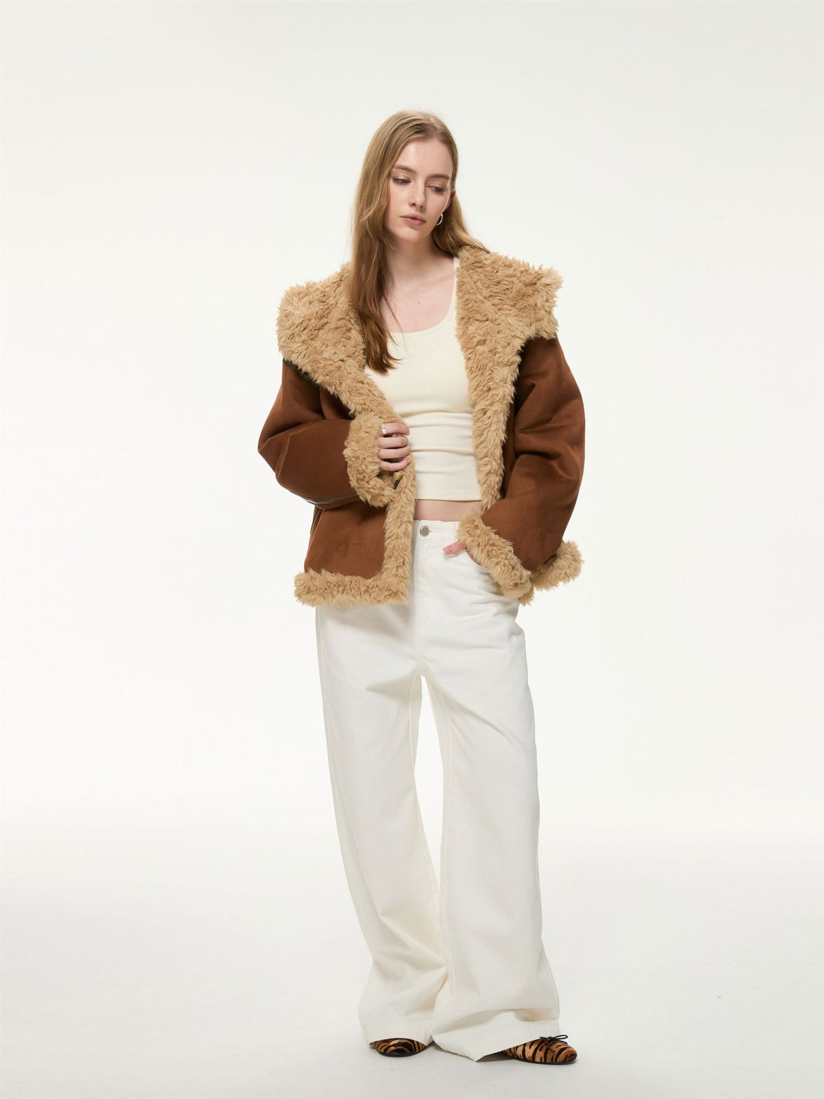 Women’s brown hooded suede shearling jacket, fuzzy trim and warm lining