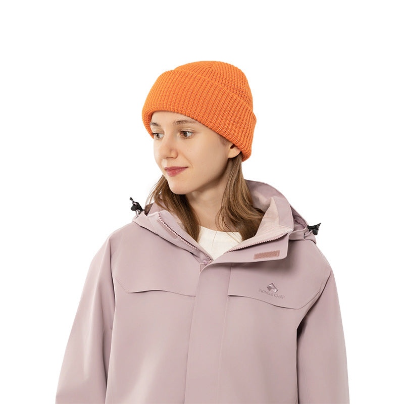 Orange knit beanie hat with folded cuff, unisex winter style