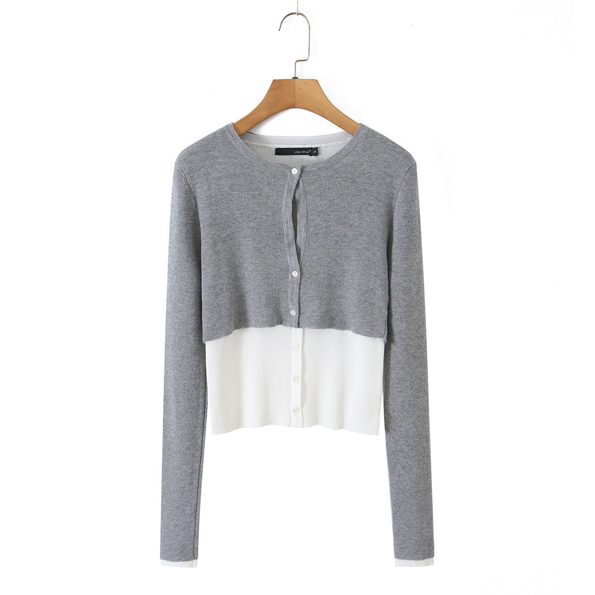 Gray and white color-block knit cardigan with button placket, long sleeves