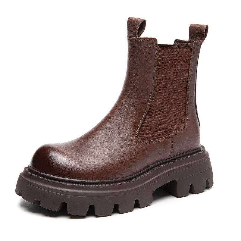 Brown leather Chelsea boot with elastic side panels and thick rubber lug sole