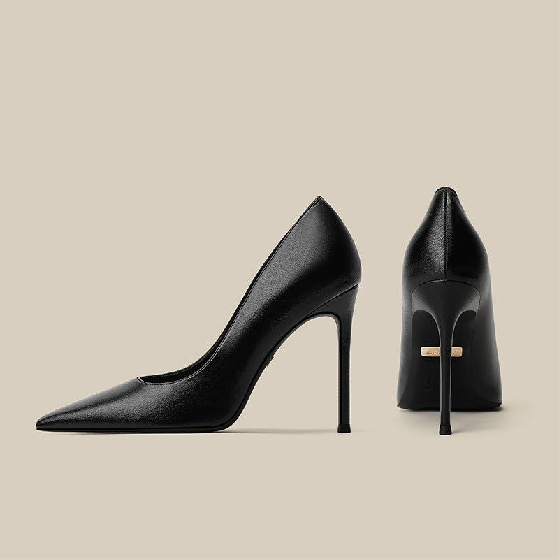 Women's black pointed-toe stiletto high heels, side and rear view