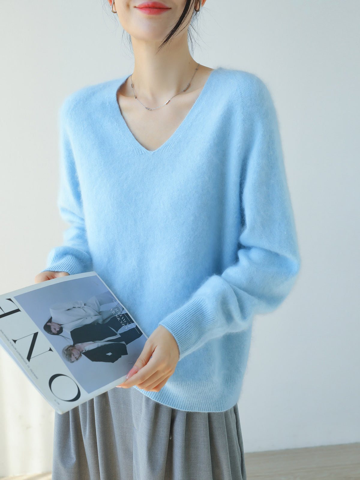 Light blue women's V-neck brushed knit sweater, relaxed long sleeves