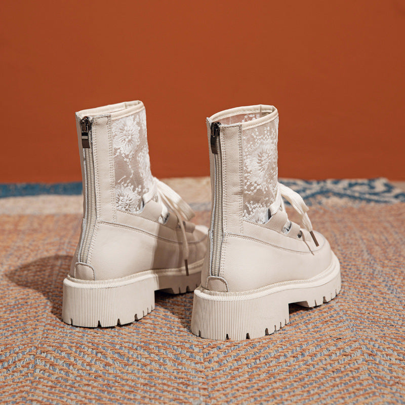 White lace-up ankle boots with chunky sole and textured mesh-look sides