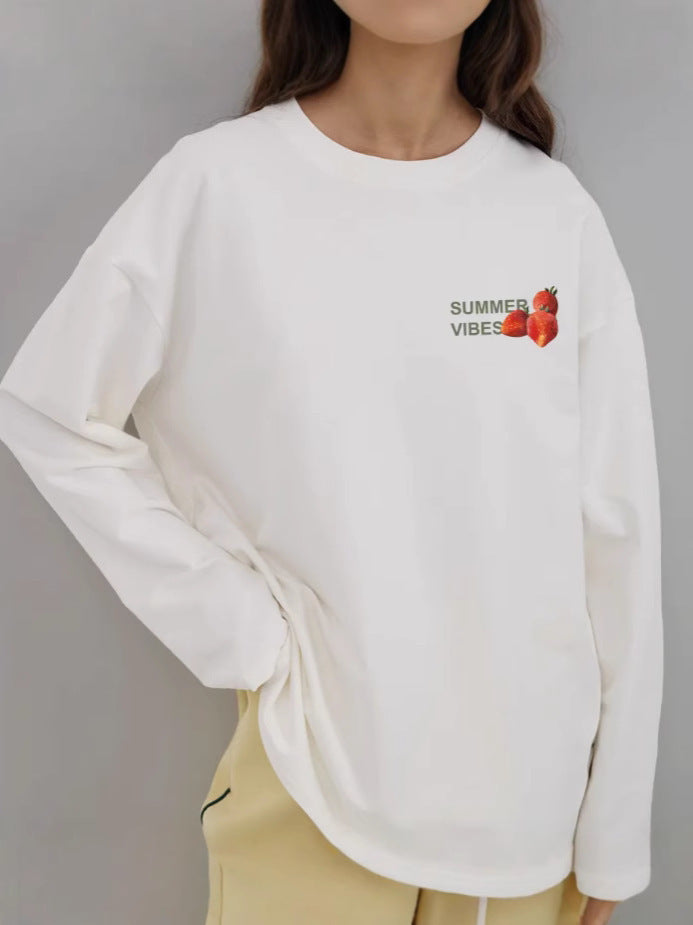 White long-sleeve cotton T-shirt, front small strawberry logo print on chest