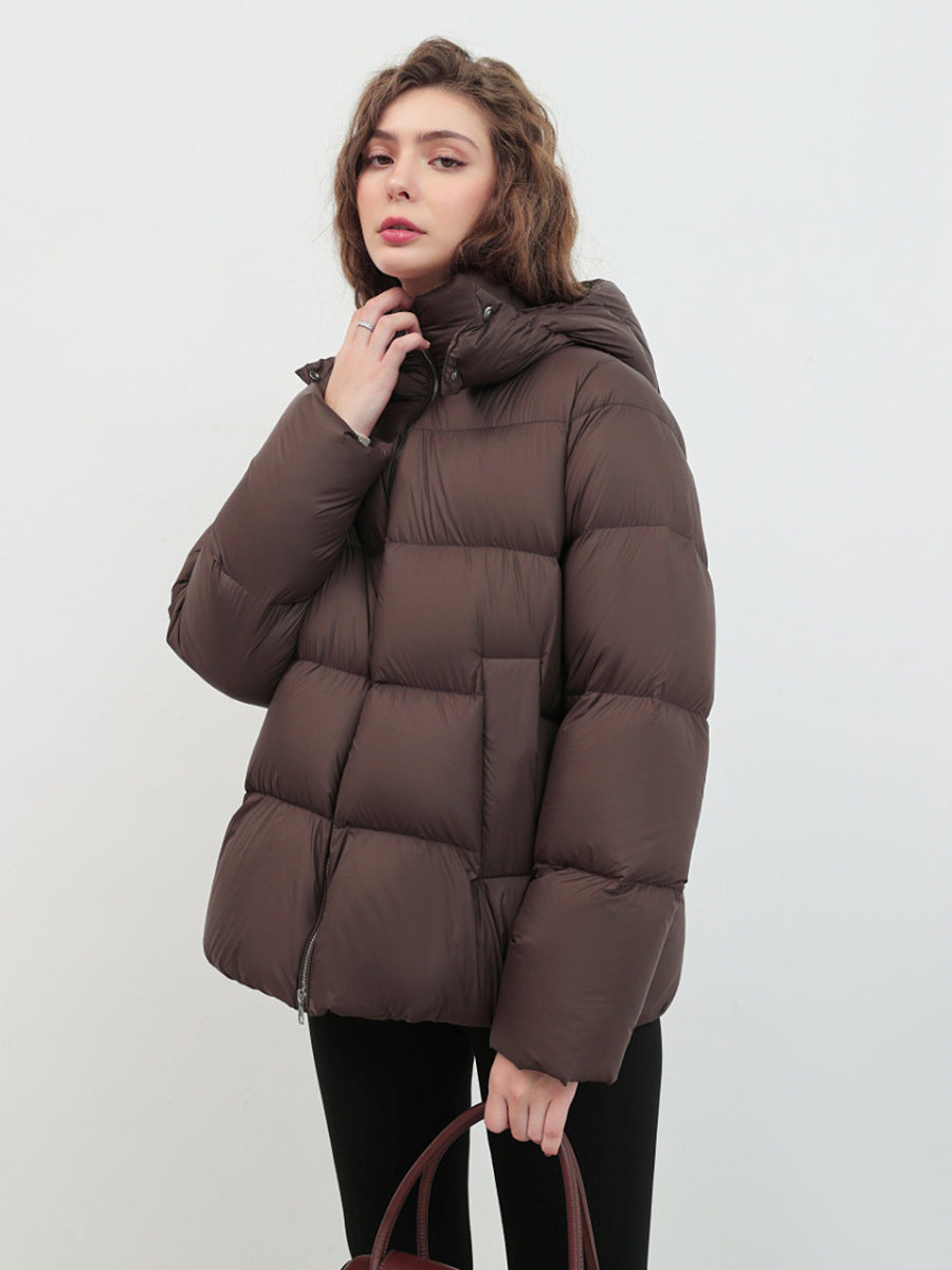 Dark brown hooded puffer jacket with short, quilted design and full-length sleeves