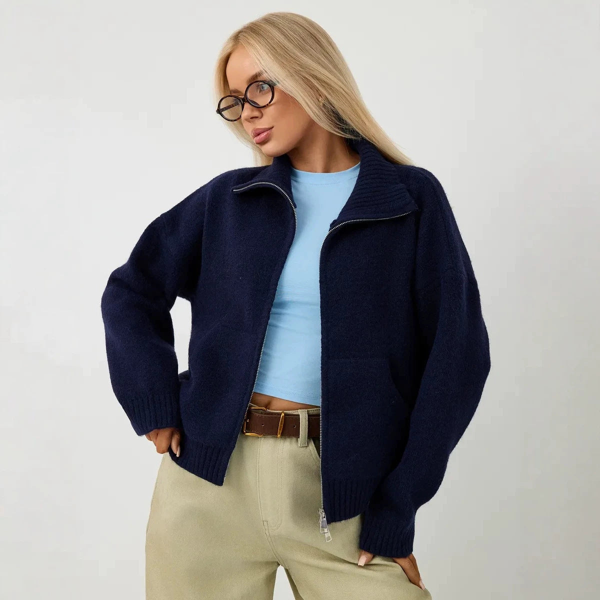 Women’s navy knitted zip-up cardigan with stand-up collar and ribbed cuffs