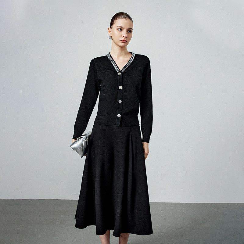 Black knit V-neck cardigan with beaded trim, button front, long sleeves, midi length