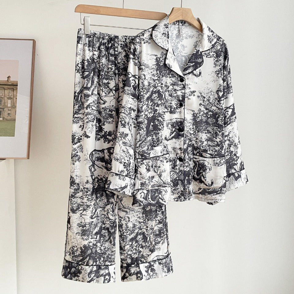 Girls’ black jungle print pajama set with button-up shirt and matching pants
