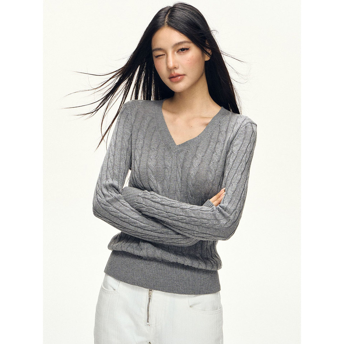 Women’s gray V-neck twist knit sweater with long sleeves, slim fitted knit