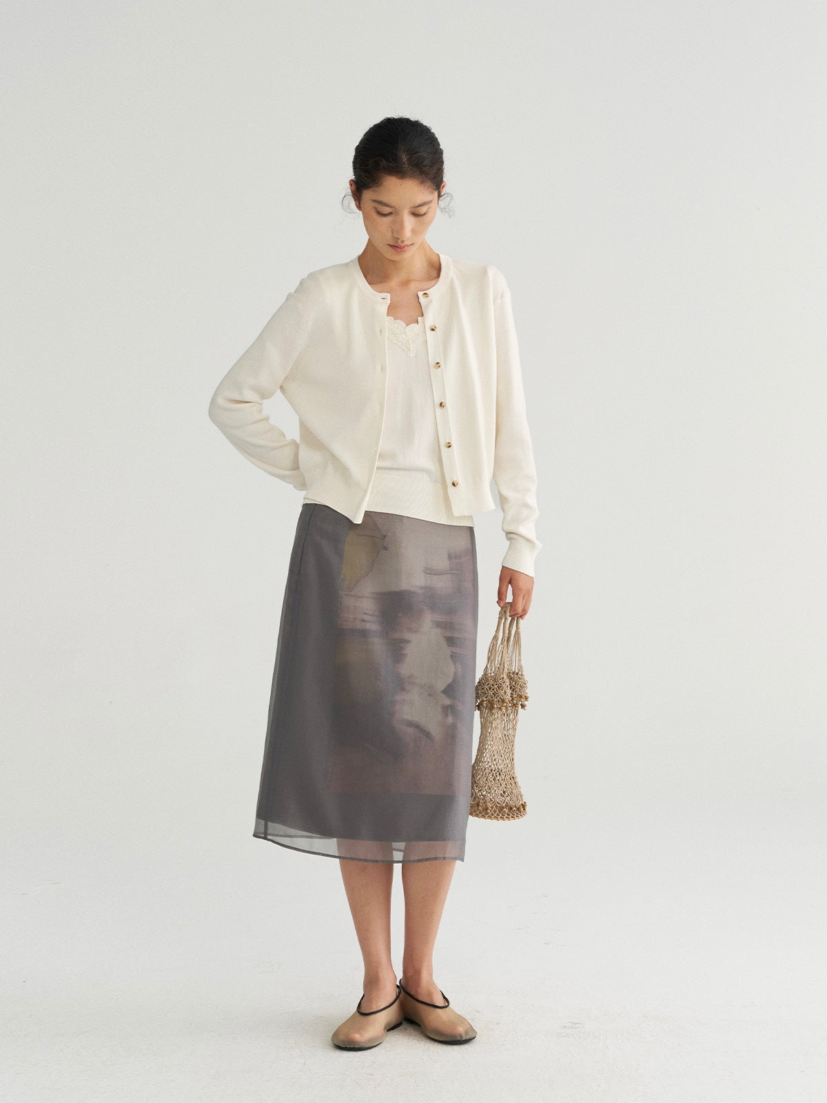 Women’s cream knit vest-coat set with button front and lace-trim camisole
