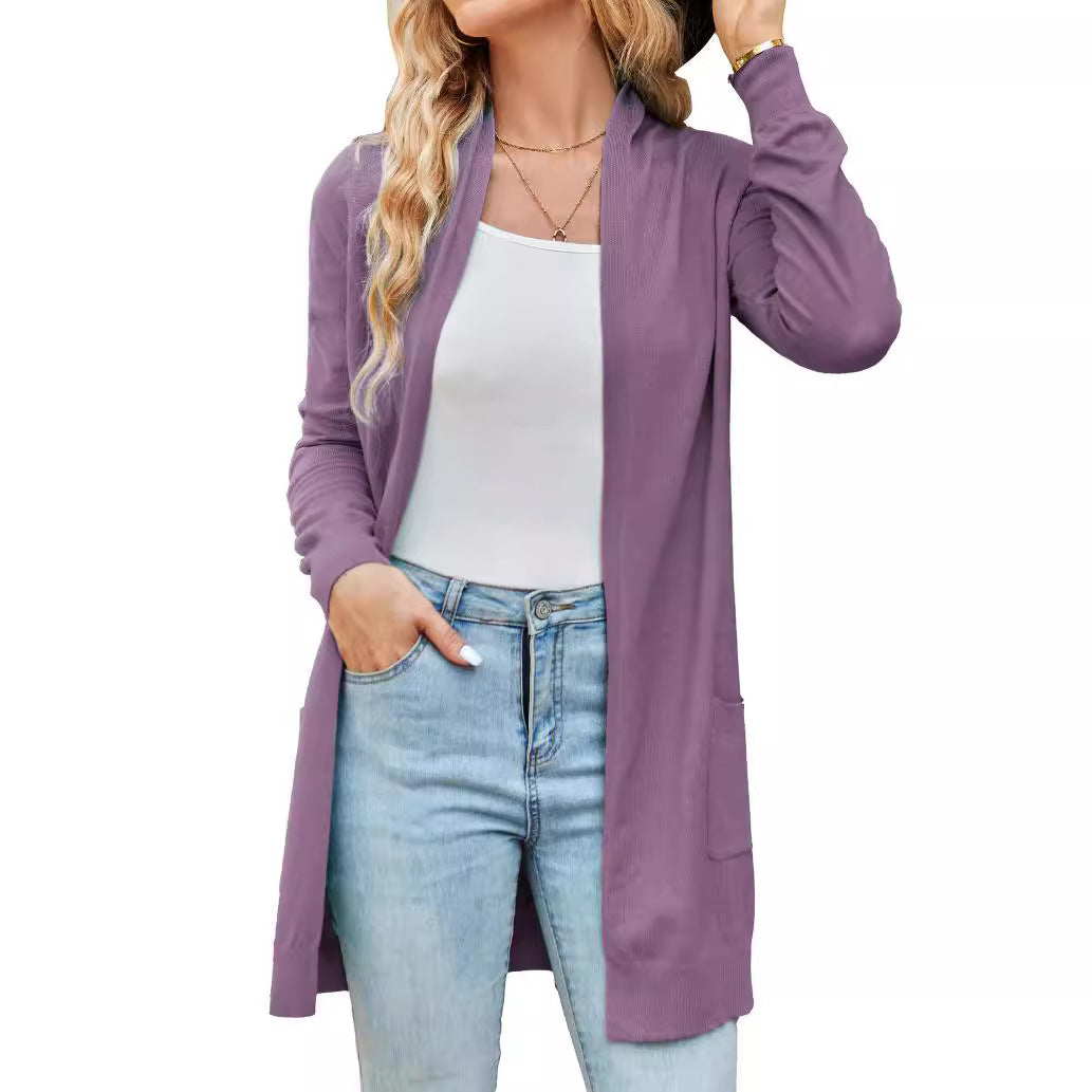 Lightweight light purple cardigan with open front, long sleeves, and patch pockets