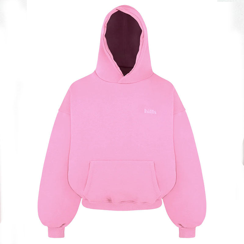Loose hooded pullover sweatshirt in pink with front kangaroo pocket and small chest text