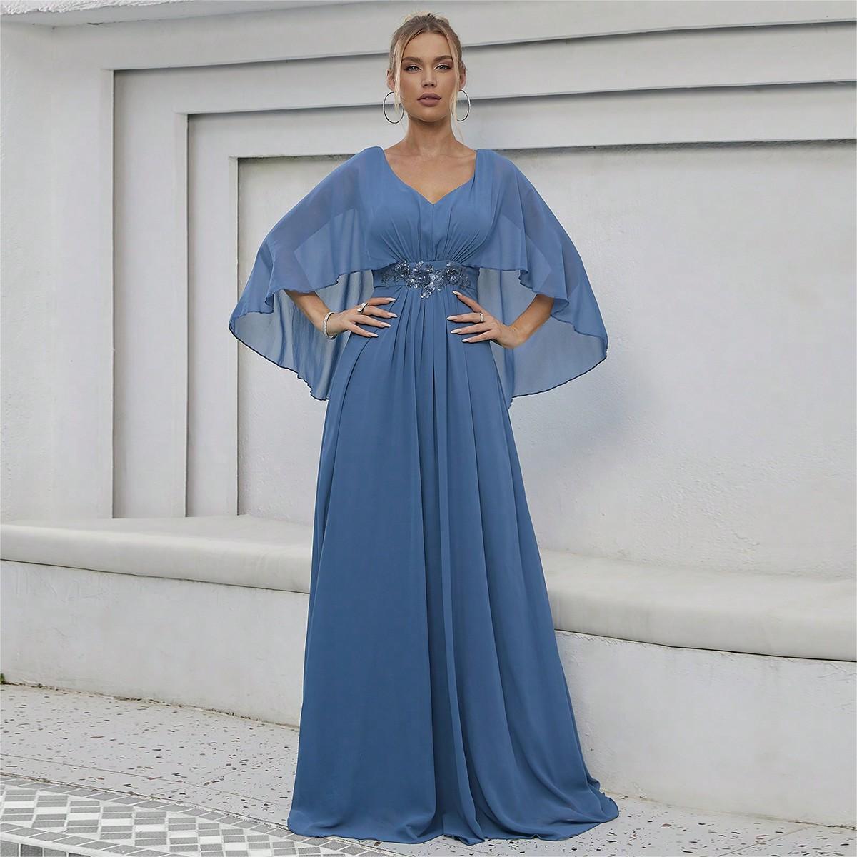 Blue V-neck evening dress with flowing cape sleeves and ruched waist detail