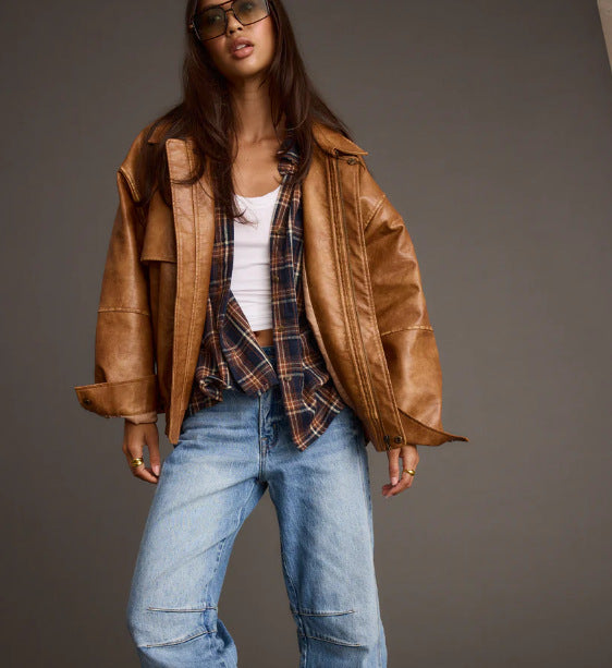 Brown PU distressed jacket with stand collar, loose fit, dropped shoulders, elastic hem