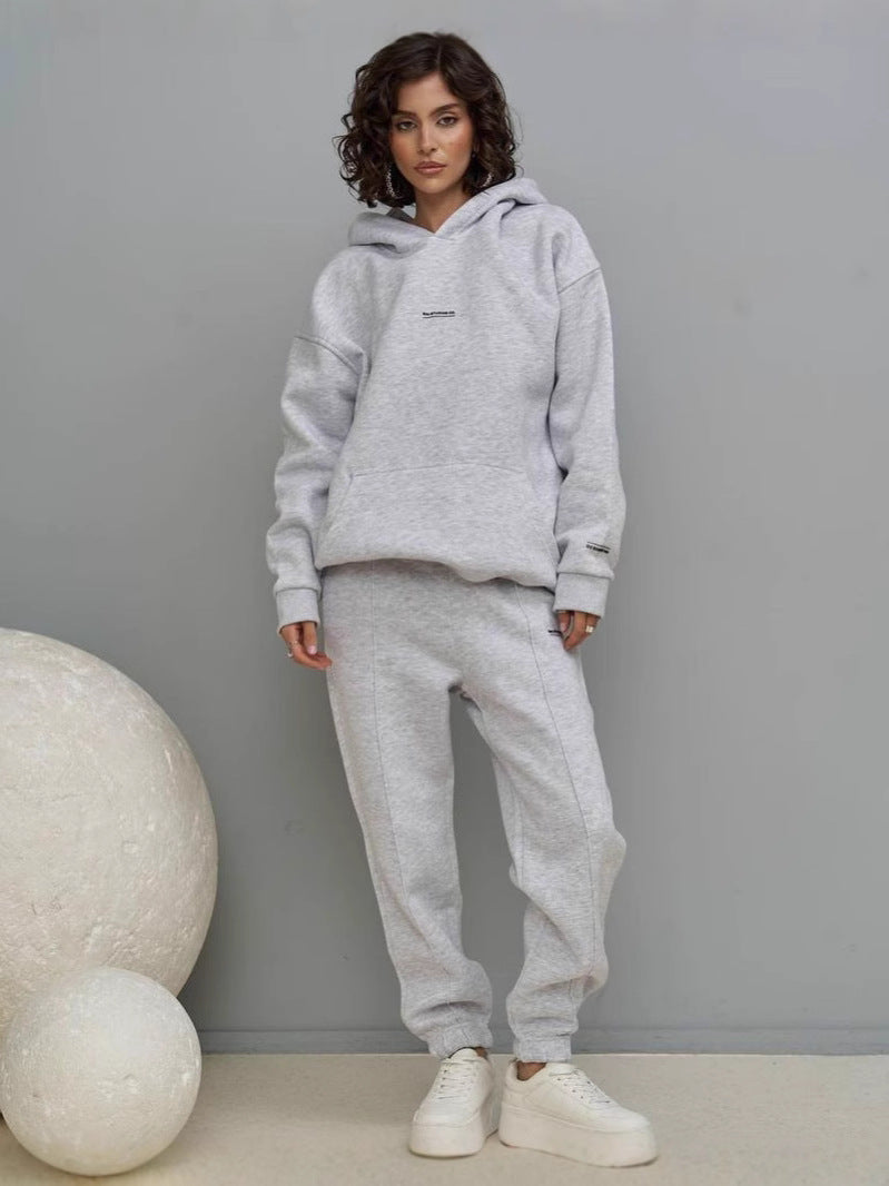 Light gray hooded sweatshirt and matching jogger pants set with cuffed hems