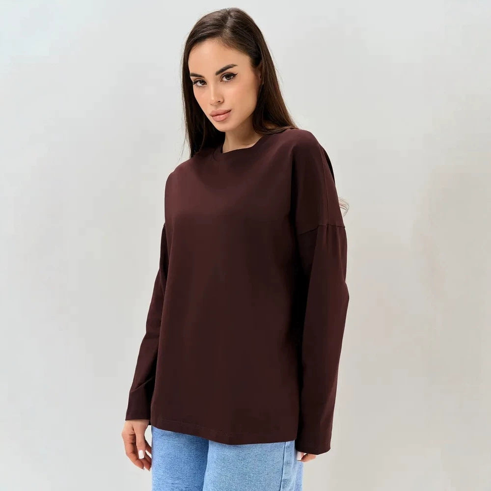 Brown long-sleeve cotton top with a round neck and relaxed fit